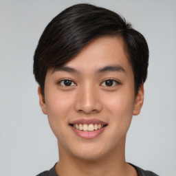 Joyful asian young-adult male with short  black hair and brown eyes