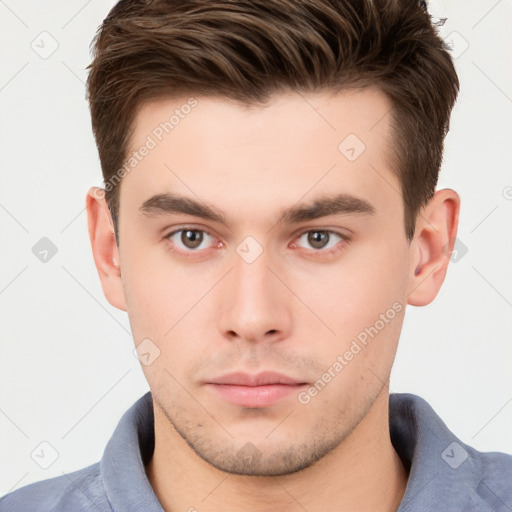 Neutral white young-adult male with short  brown hair and brown eyes