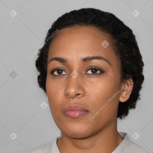 Neutral black young-adult female with short  black hair and brown eyes