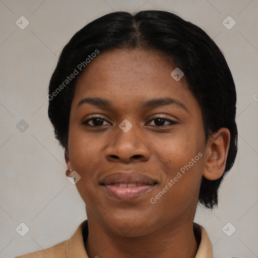 Joyful black young-adult female with short  black hair and brown eyes