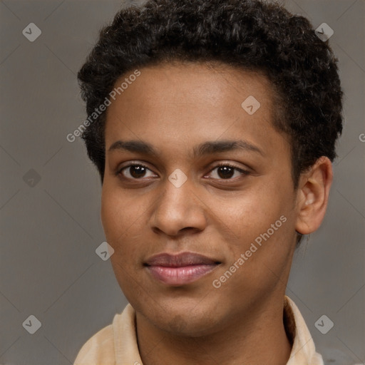 Joyful black young-adult male with short  brown hair and brown eyes