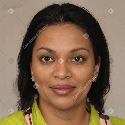 Joyful black adult female with medium  brown hair and brown eyes