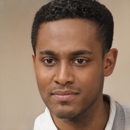 Neutral black young-adult male with short  black hair and brown eyes