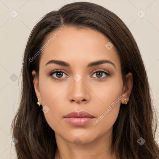 Neutral white young-adult female with long  brown hair and brown eyes