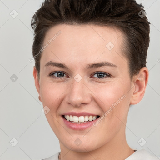 Joyful white young-adult female with short  brown hair and brown eyes