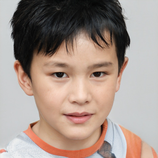 Joyful white child male with short  brown hair and brown eyes