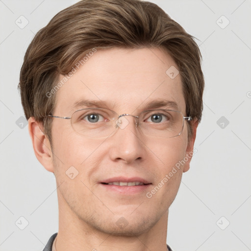 Joyful white adult male with short  brown hair and grey eyes