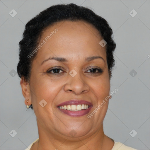 Joyful black adult female with short  brown hair and brown eyes