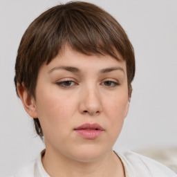 Neutral white young-adult female with short  brown hair and brown eyes