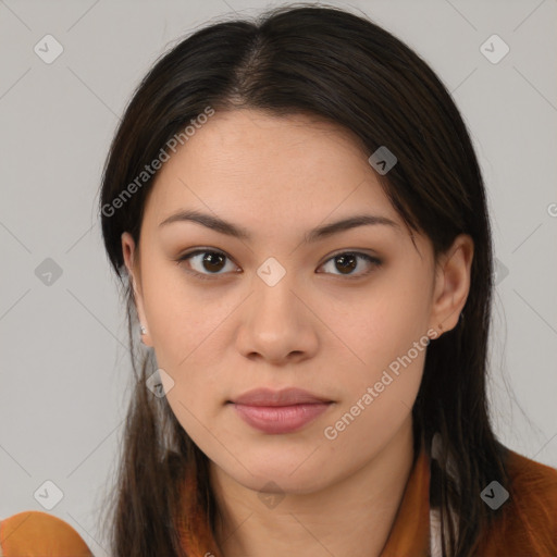 Joyful asian young-adult female with long  brown hair and brown eyes