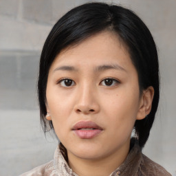 Neutral asian young-adult female with medium  black hair and brown eyes