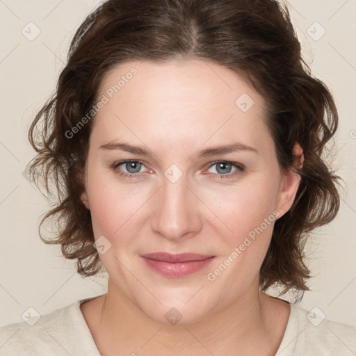 Joyful white young-adult female with medium  brown hair and green eyes