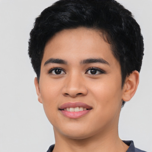 Joyful asian young-adult female with short  black hair and brown eyes