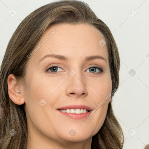 Joyful white young-adult female with long  brown hair and grey eyes