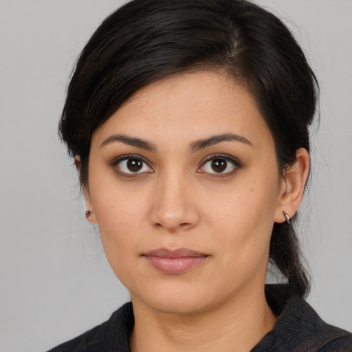 Neutral latino young-adult female with medium  black hair and brown eyes