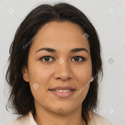 Joyful latino young-adult female with medium  brown hair and brown eyes