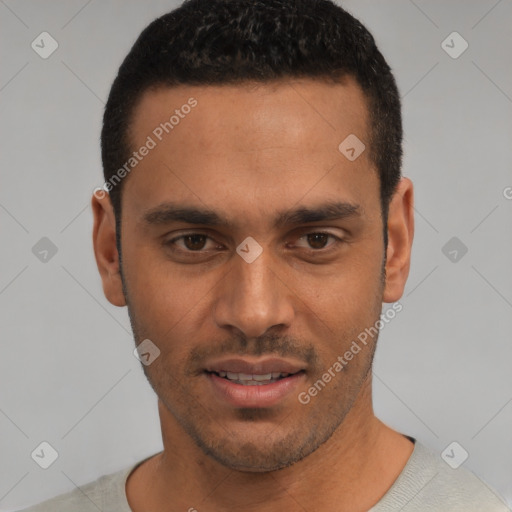 Joyful white young-adult male with short  black hair and brown eyes