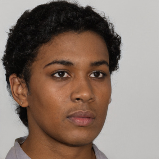 Neutral black young-adult female with short  black hair and brown eyes