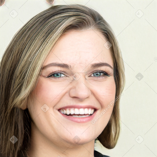 Joyful white young-adult female with long  brown hair and green eyes