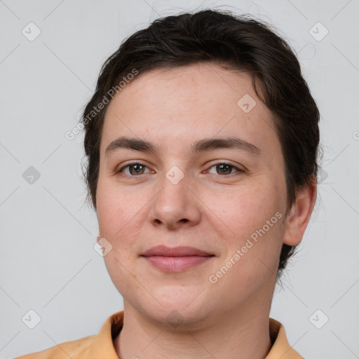 Joyful white young-adult female with short  brown hair and brown eyes