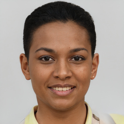 Joyful latino young-adult female with short  black hair and brown eyes
