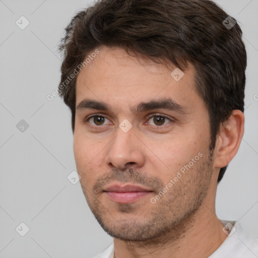 Neutral white young-adult male with short  brown hair and brown eyes