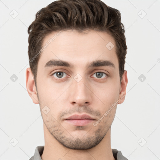 Neutral white young-adult male with short  brown hair and brown eyes