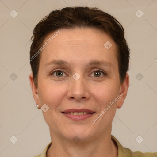 Joyful white adult female with short  brown hair and brown eyes