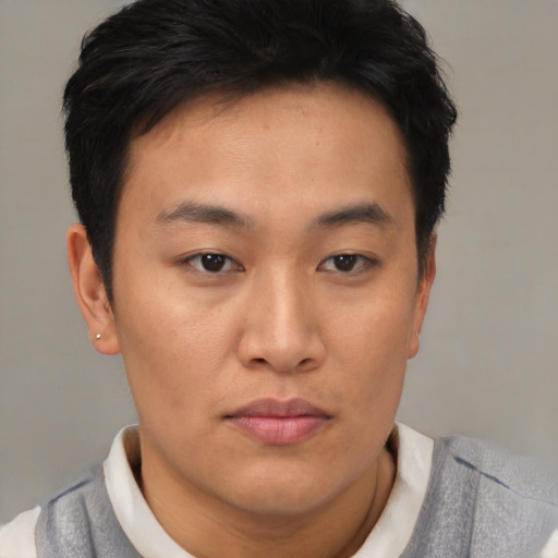 Neutral asian young-adult male with short  brown hair and brown eyes