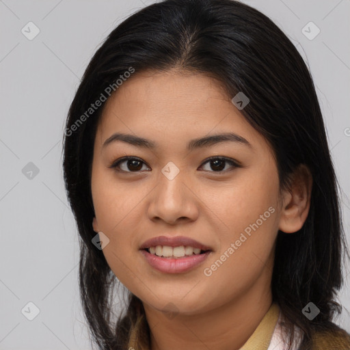 Joyful asian young-adult female with long  brown hair and brown eyes