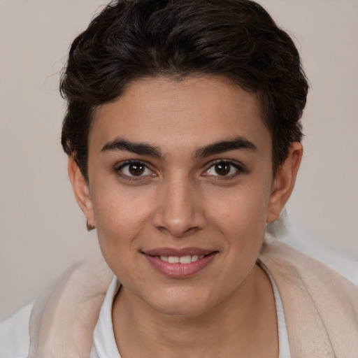 Joyful white young-adult female with short  brown hair and brown eyes