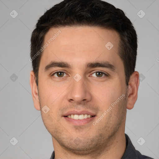 Joyful white young-adult male with short  brown hair and brown eyes