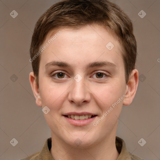 Joyful white young-adult female with short  brown hair and grey eyes