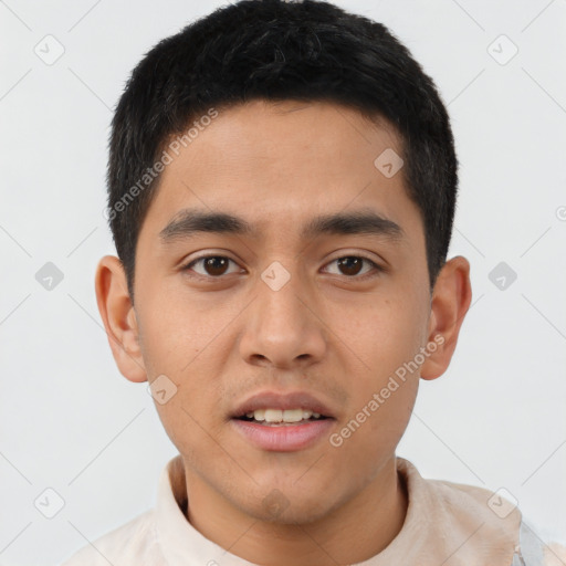 Joyful latino young-adult male with short  black hair and brown eyes