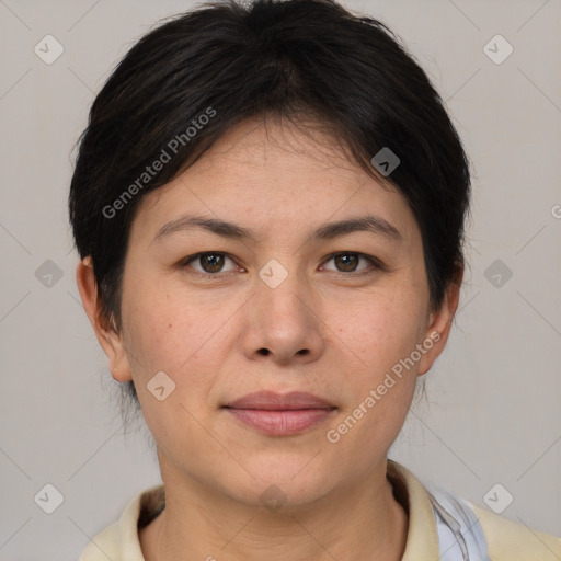 Joyful white adult female with short  brown hair and brown eyes