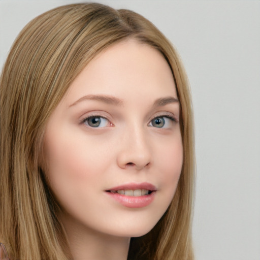 Joyful white young-adult female with long  brown hair and blue eyes