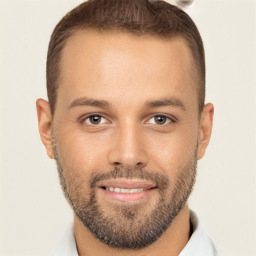 Joyful white young-adult male with short  brown hair and brown eyes