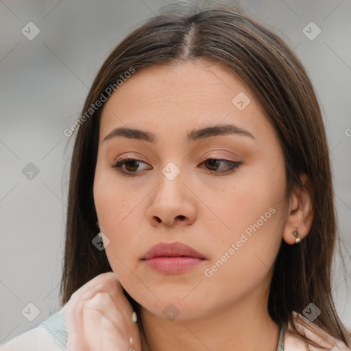 Neutral white young-adult female with medium  brown hair and brown eyes