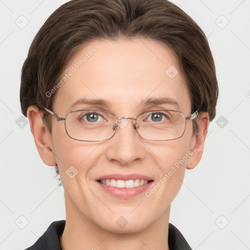 Joyful white adult female with short  brown hair and grey eyes