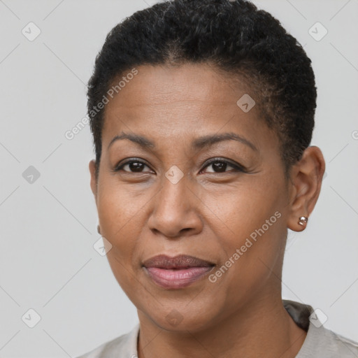 Joyful black adult female with short  brown hair and brown eyes