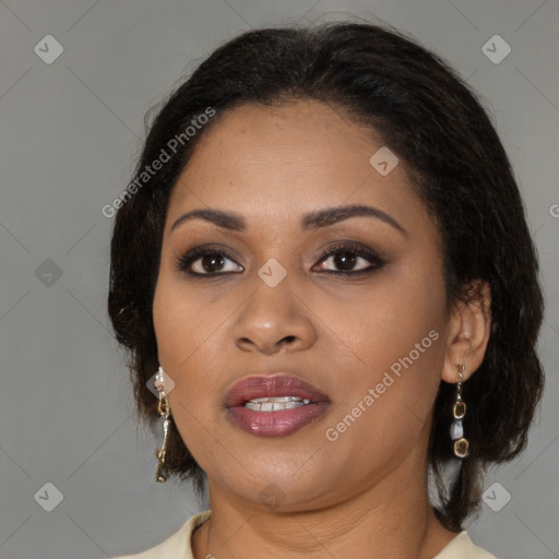 Joyful black young-adult female with medium  brown hair and brown eyes