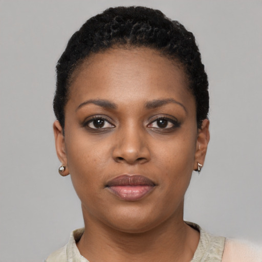 Neutral black young-adult female with short  black hair and brown eyes