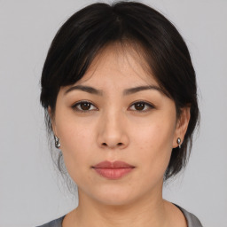 Neutral asian young-adult female with medium  brown hair and brown eyes