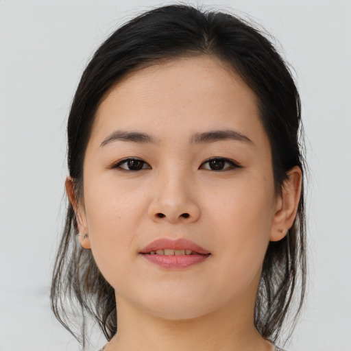 Joyful asian young-adult female with medium  brown hair and brown eyes