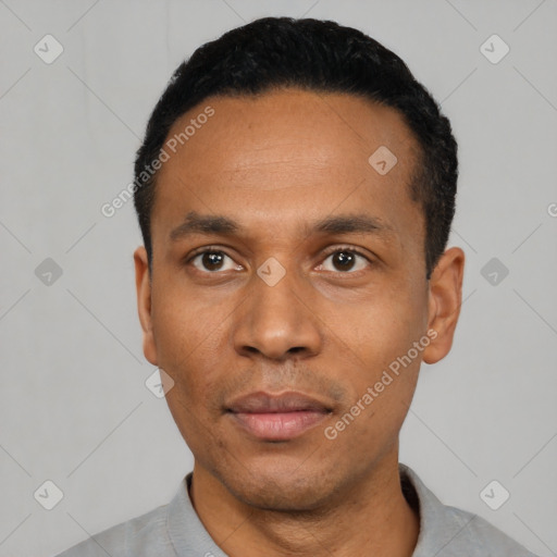 Neutral latino young-adult male with short  black hair and brown eyes