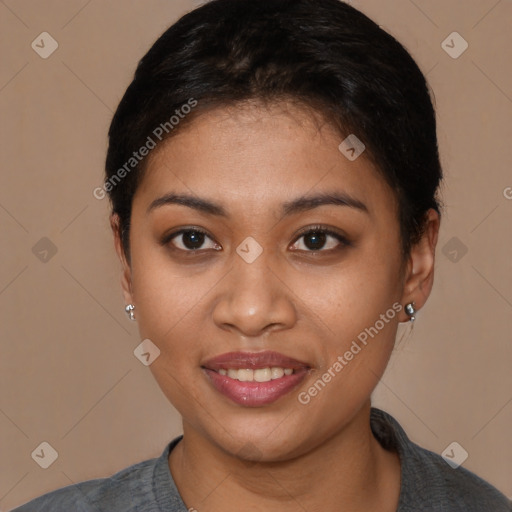 Joyful latino young-adult female with short  brown hair and brown eyes