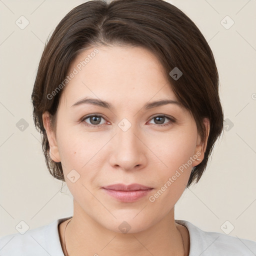 Neutral white young-adult female with medium  brown hair and brown eyes