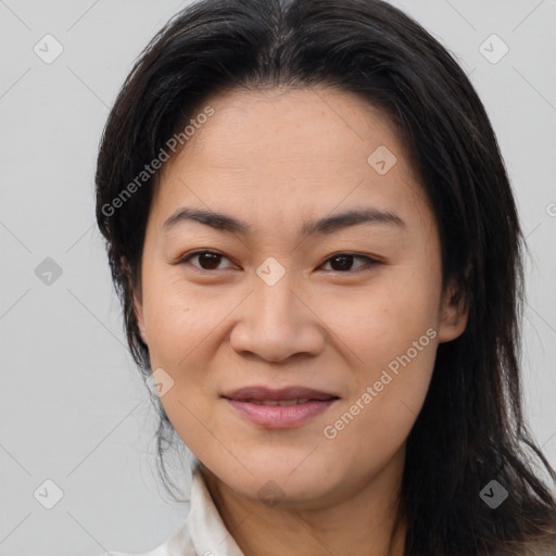 Joyful asian young-adult female with medium  brown hair and brown eyes