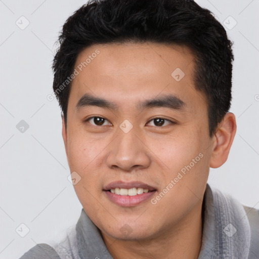 Joyful white young-adult male with short  black hair and brown eyes