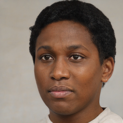Neutral black young-adult female with short  black hair and brown eyes